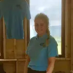 Girl with blue tshirt and clip board in County Antrim