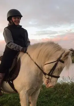 Girl on all white horse in County Antrim