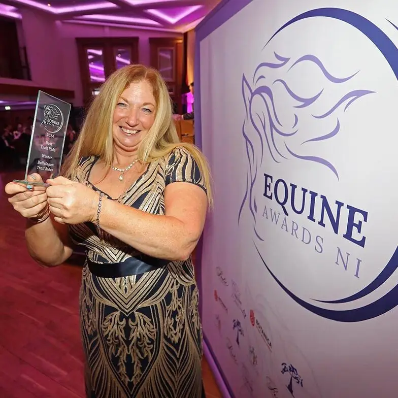 Woman holding Equine Awards NI 2023 award in County Antrim